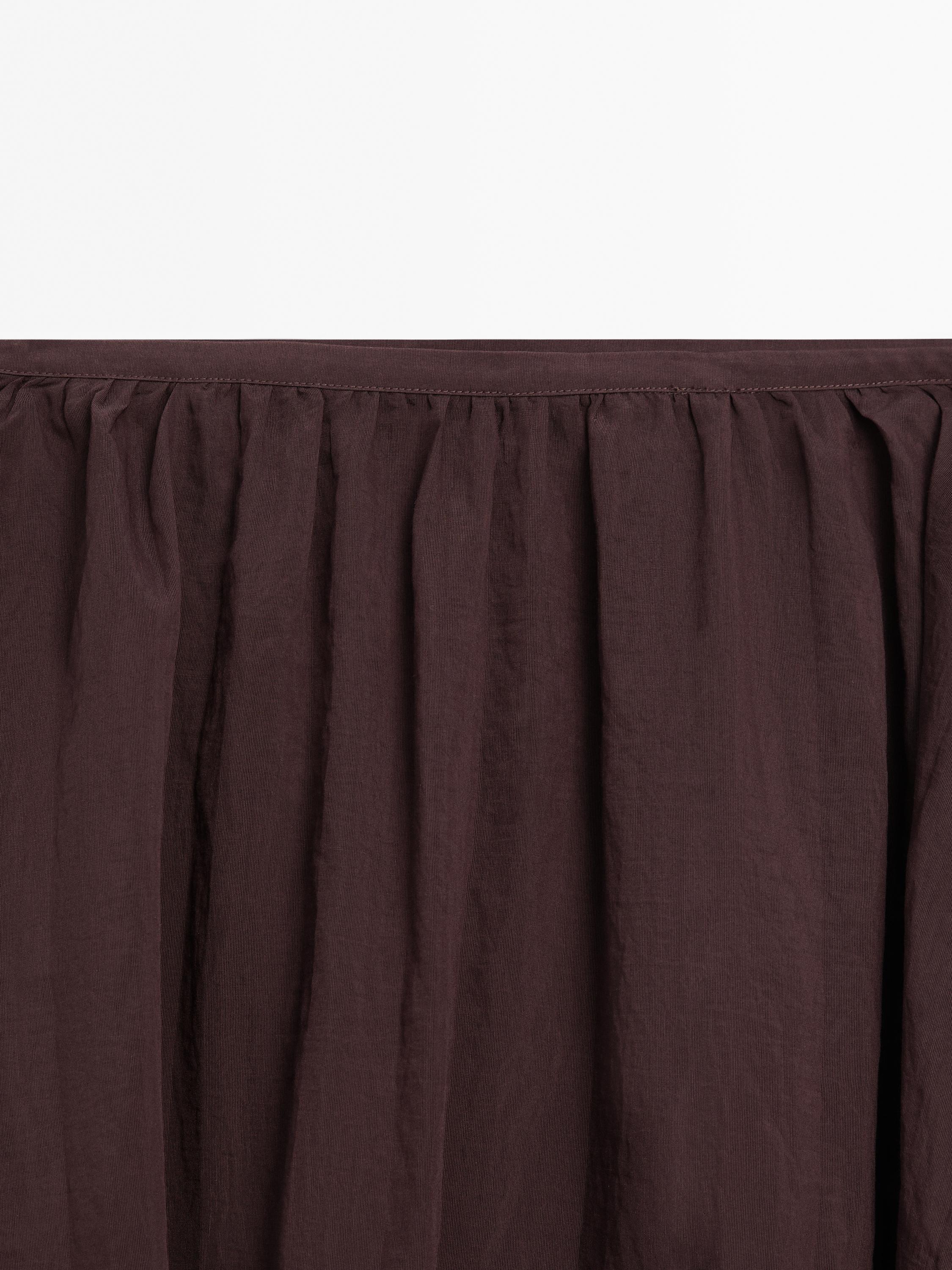 Jupe midi bouffante plissée